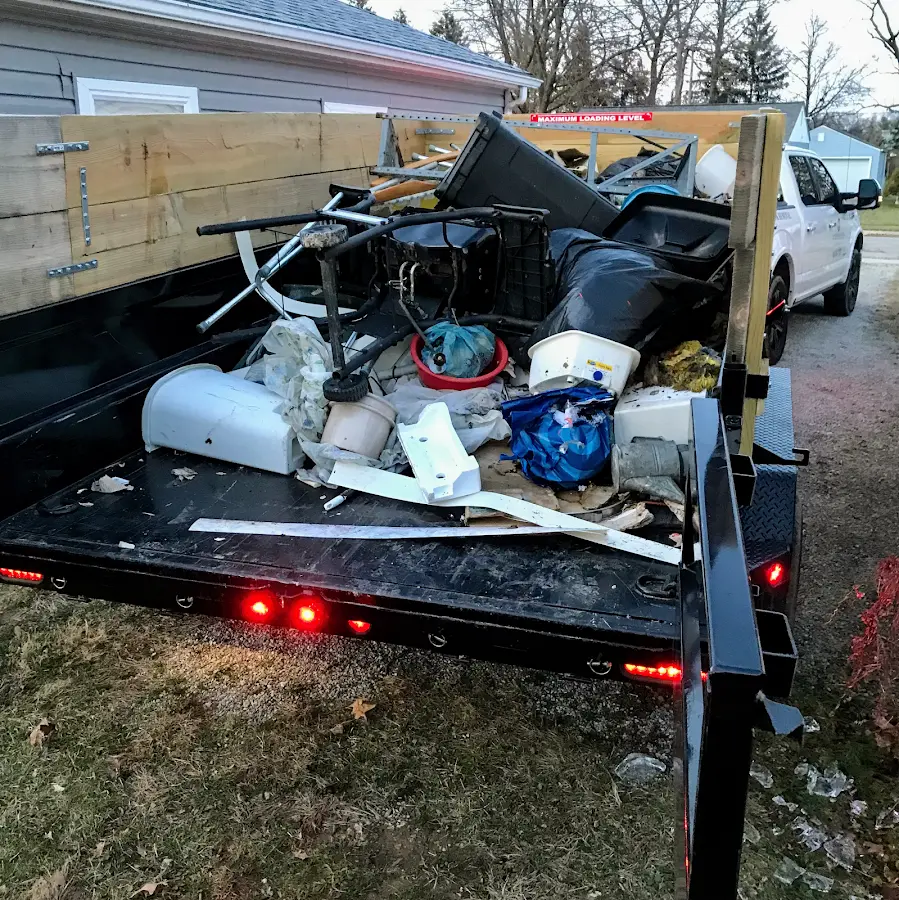 Roll-off dumpster delivered to a residential driveway in Evansville